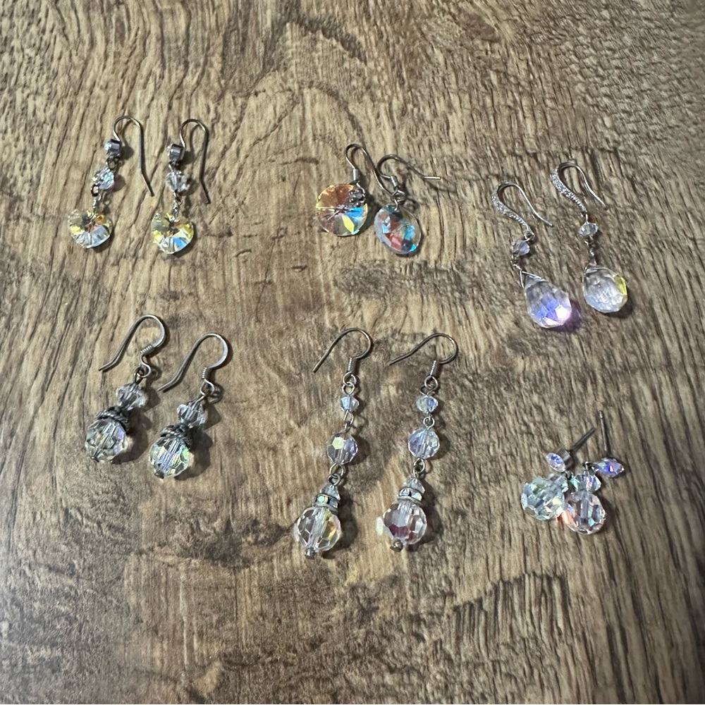 6 iridescent pairs of earrings.
